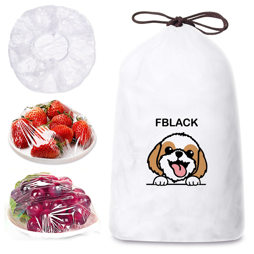 Reusable elastic bowl covers stretched over bowls and plates in kitchen