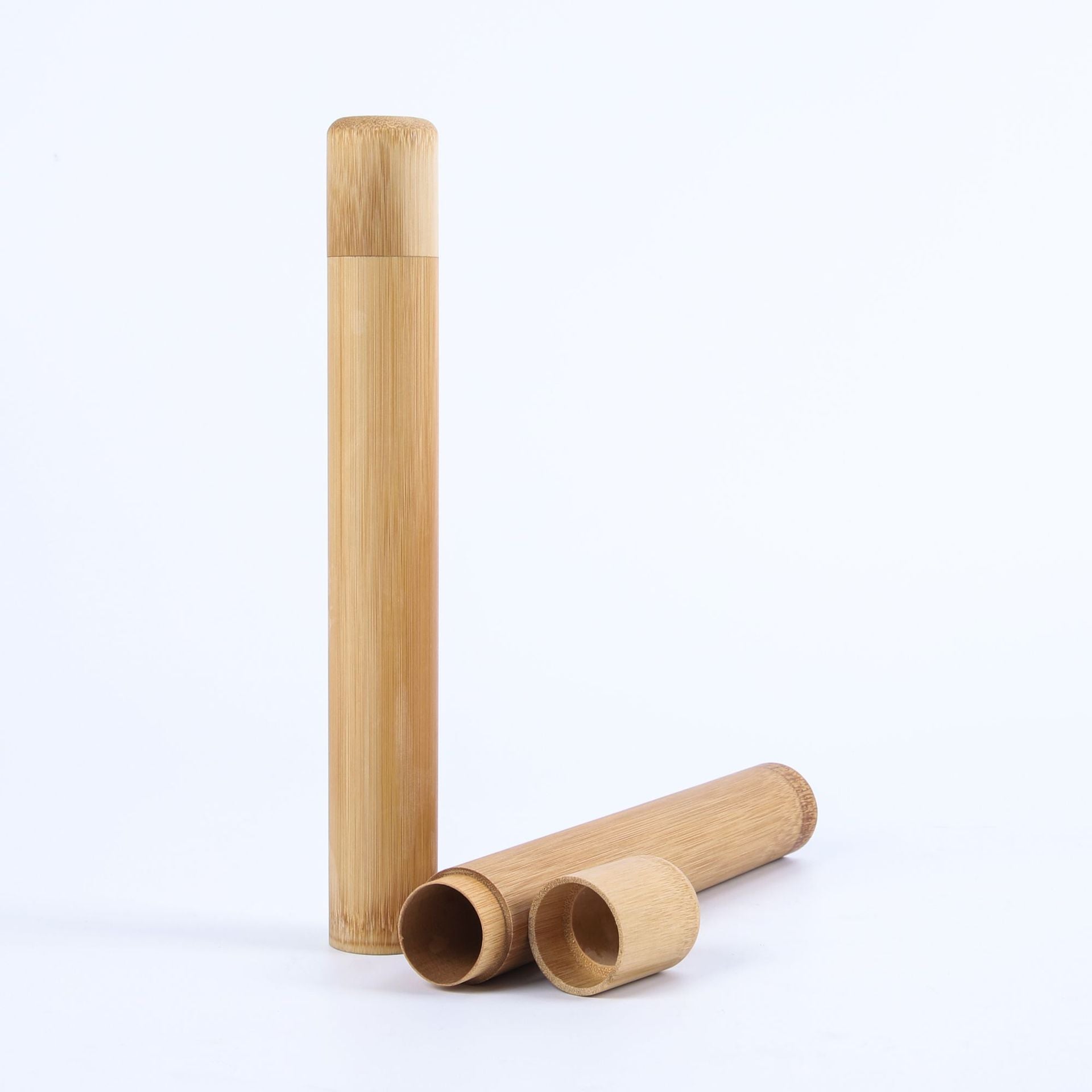 Biodegradable bamboo toothbrush set with charcoal soft bristles on bath counter